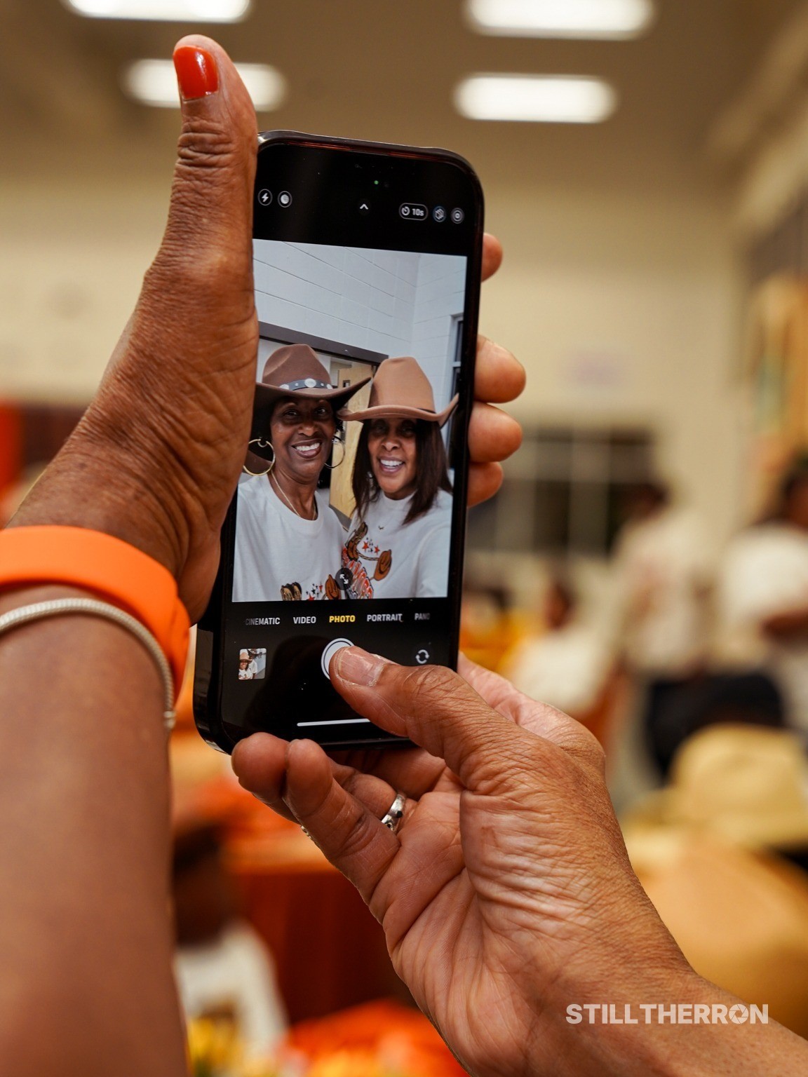 Women taking a selfie together.